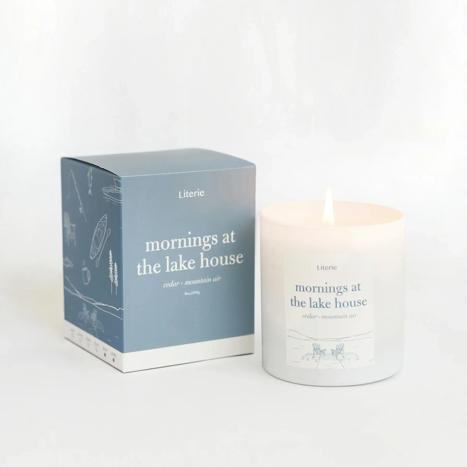 Image shows a candle labeled “Mornings at the Lakehouse”
