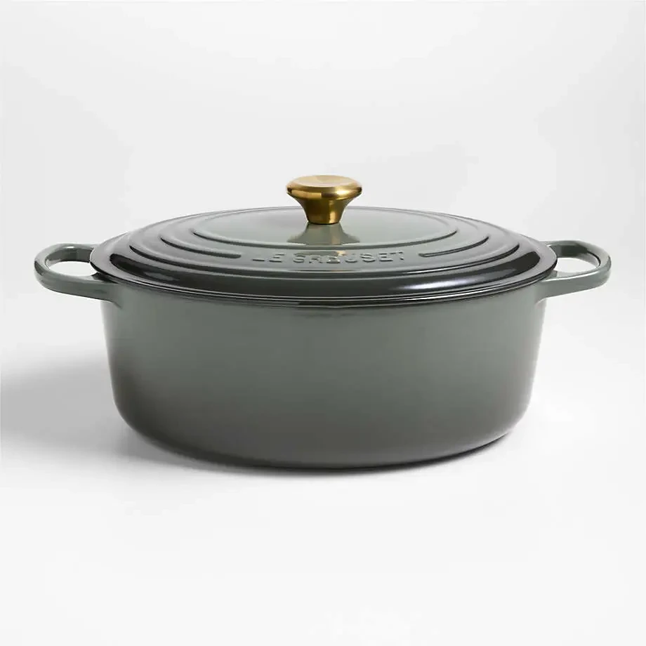 image shows a Le Creuset Signature 8-Qt. Thyme Enameled Cast Iron Oval Dutch Oven