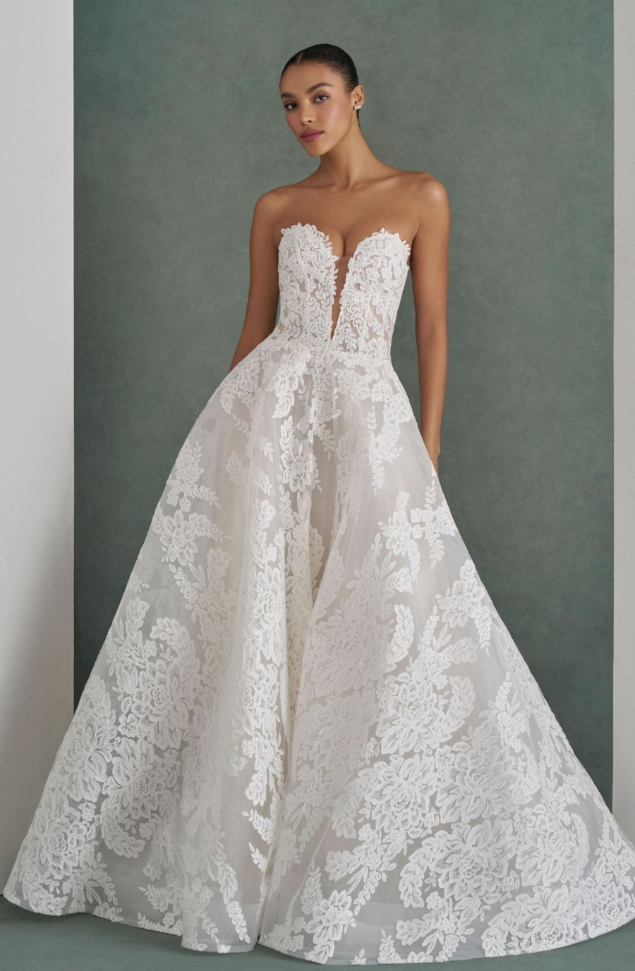 model is wearing a strapless a-line bridal gown