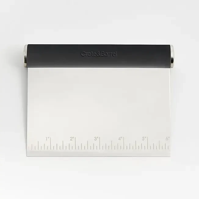 image shows a Crate & Barrel Soft-Touch Bench Scraper