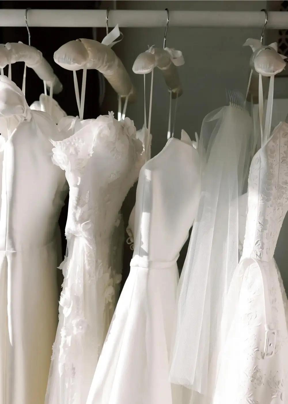 image of wedding dresses on hangers